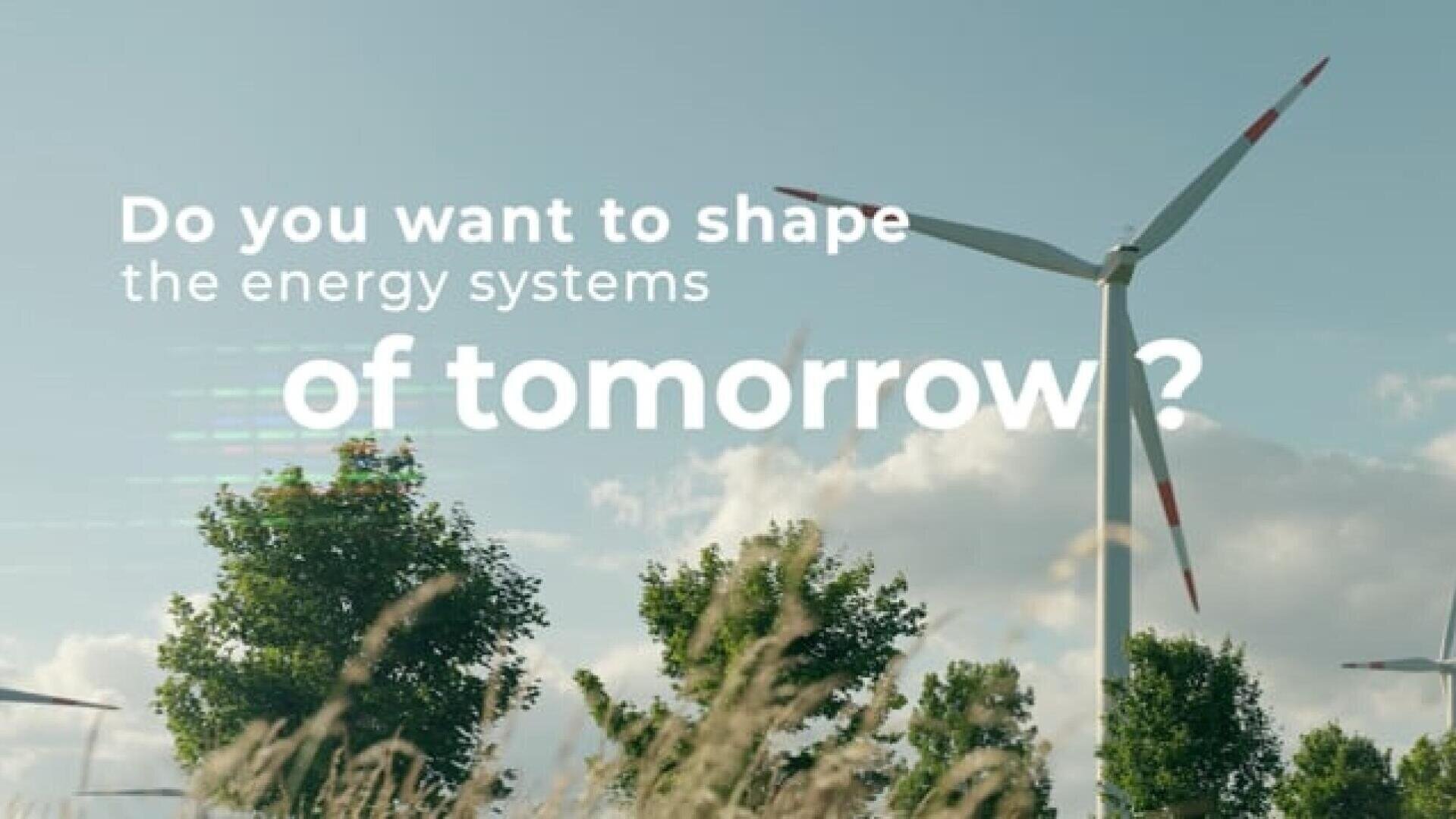 Windturbinen auf einer grünen Wiese unter einem blauen Himmel mit vereinzelten Wolken. Der Text über dem Bild lautet: "Wollen Sie die Energiesysteme von morgen gestalten?".