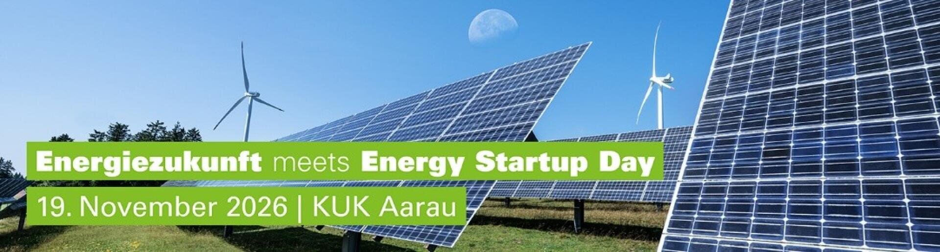 Solar panels and wind turbines in a field under a blue sky, with event text: Energiezukunft meets Energy Startup Day, 19. November 2026 | KUK Aarau..